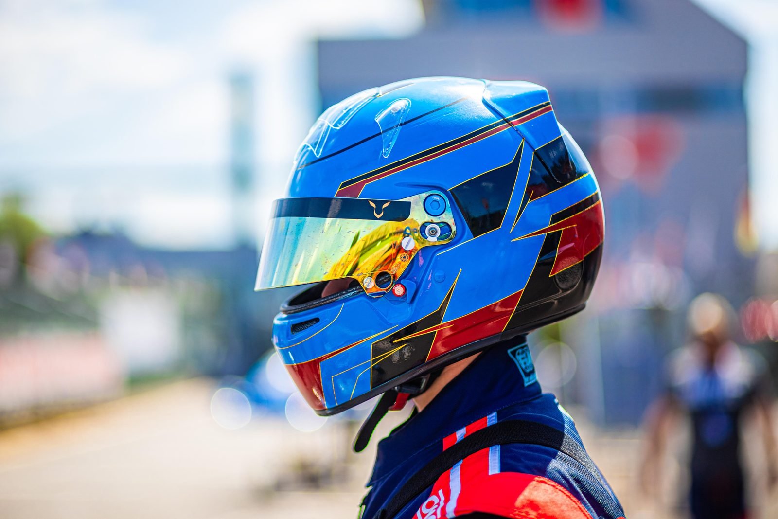 Profile of Samuel Uváček in a blue helmet before a run