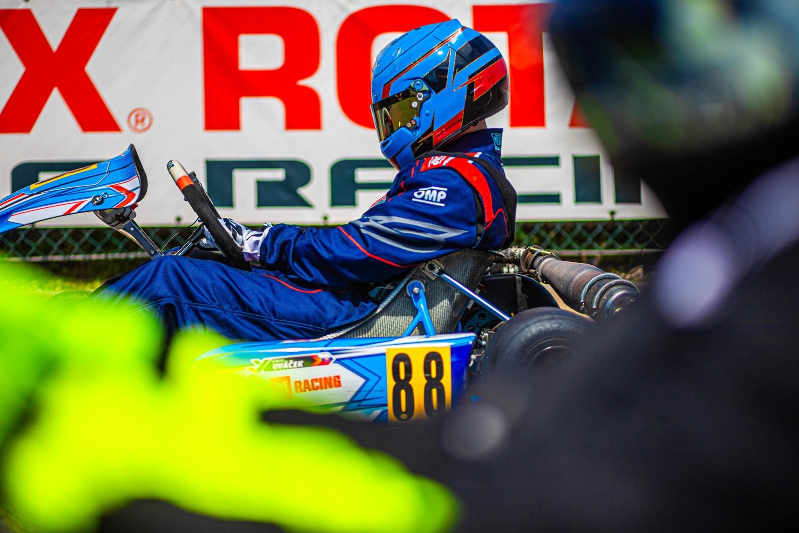 Samuel Uváček in kart number 88 seen from the side, Maxxis Racing, Tillotson T4 Senior class
